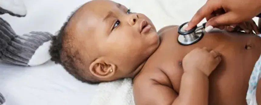 baby receiving a doctor check-up
